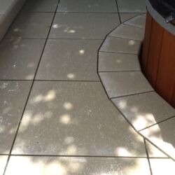 Paving around spa pool with curved border