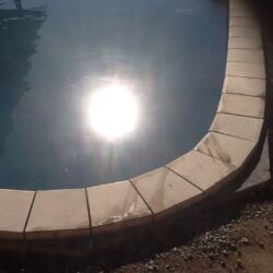 Paved border around pool