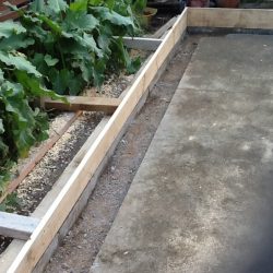 Concrete boxing for pad