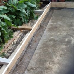 Concrete boxing for pad